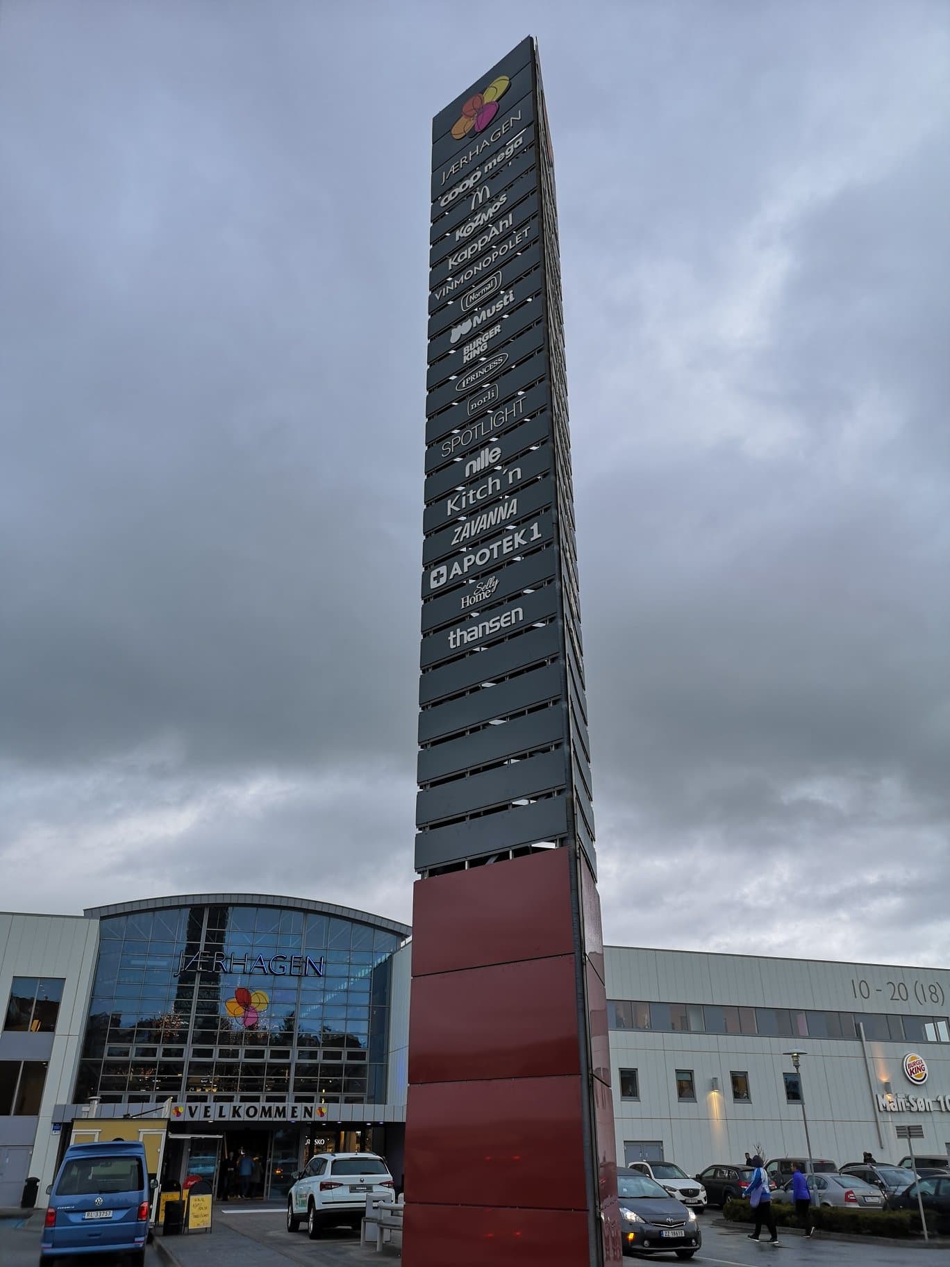 Tall mast sign for Jaerhagen shopping centre with logos for Coop Mega, KappAhl, Apotek 1 and multiple stores