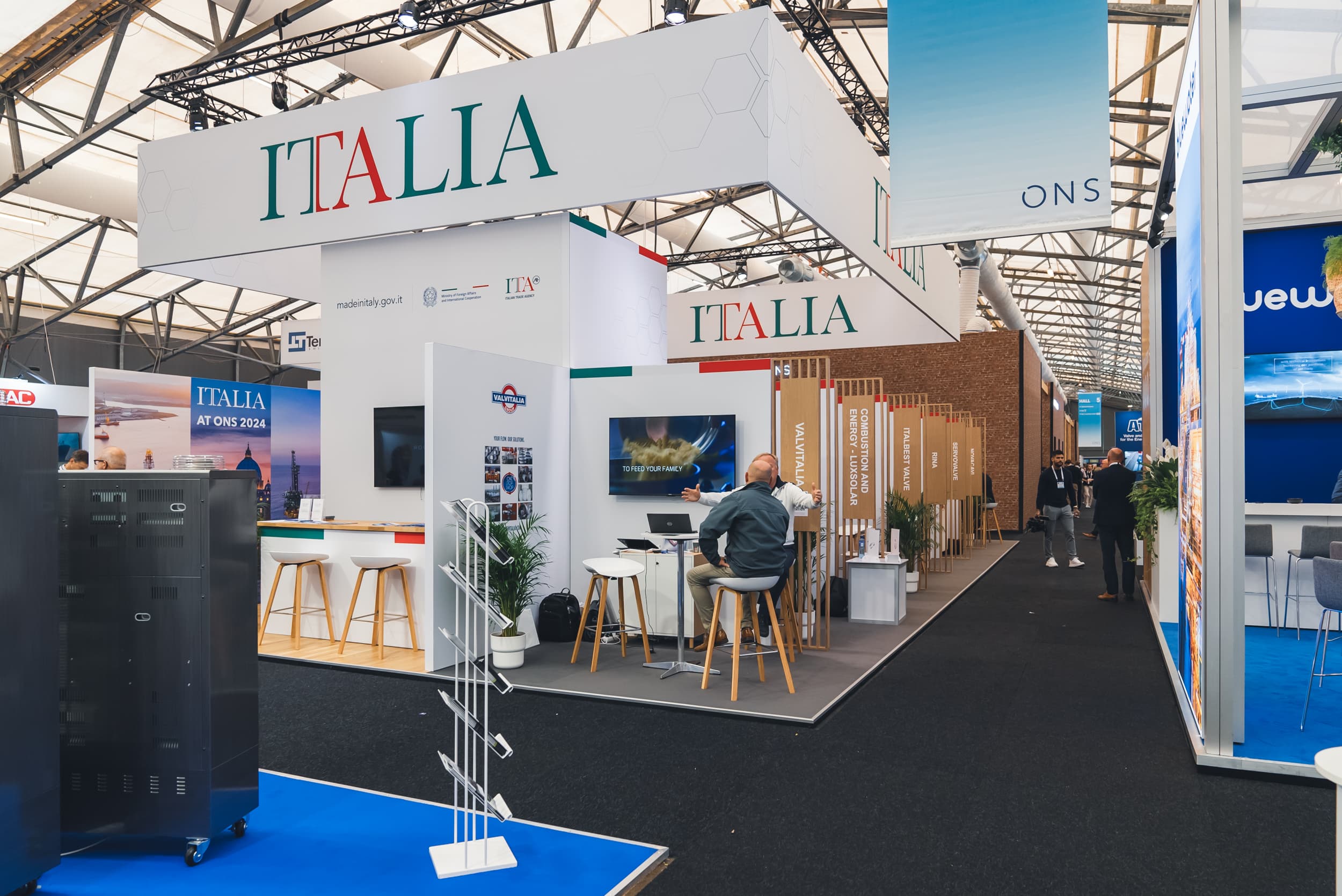 Italian Pavilion at ONS 2024 with shared area and exhibitor booths