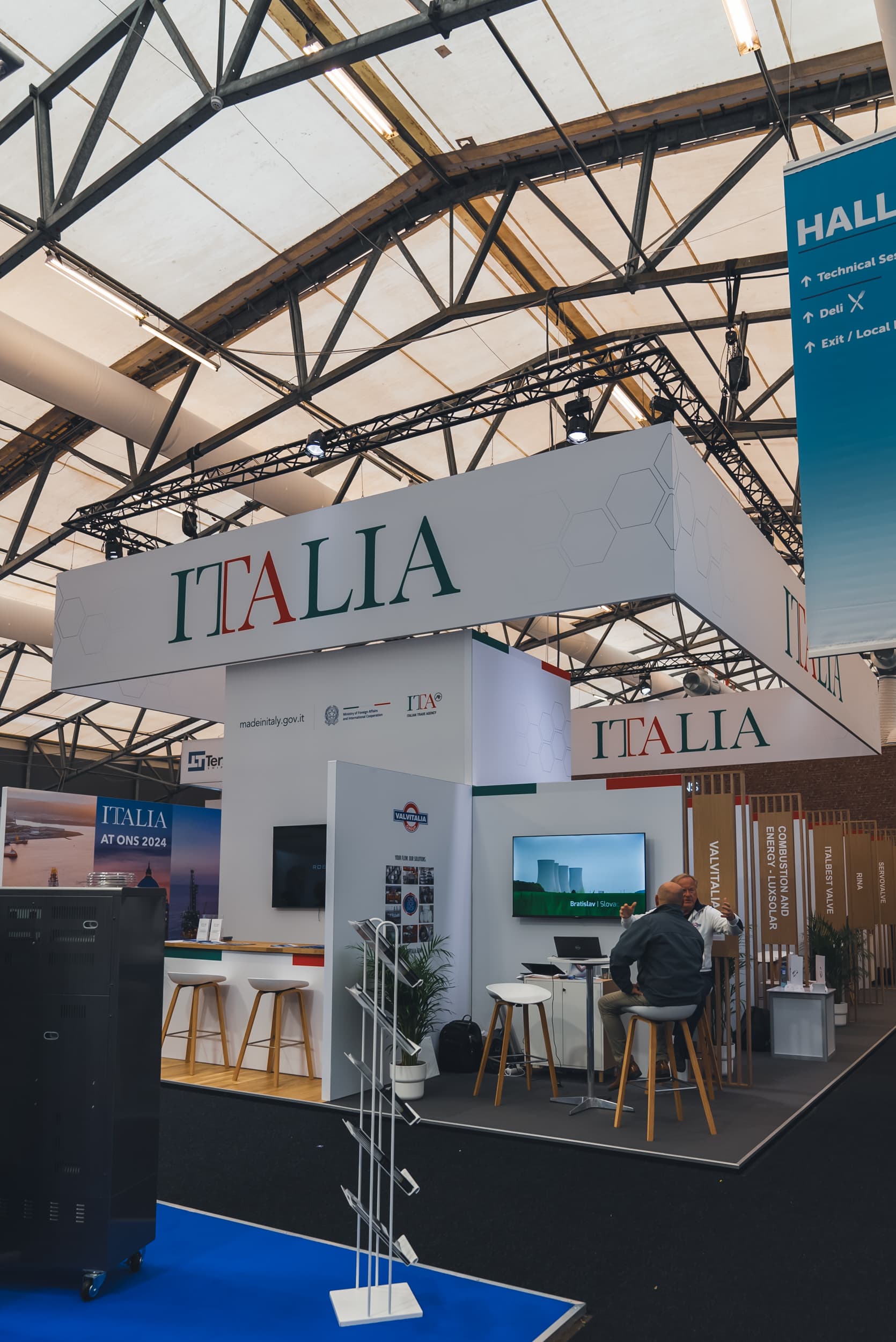 Italian Pavilion at ONS 2024 with shared area and exhibitor booths (2)