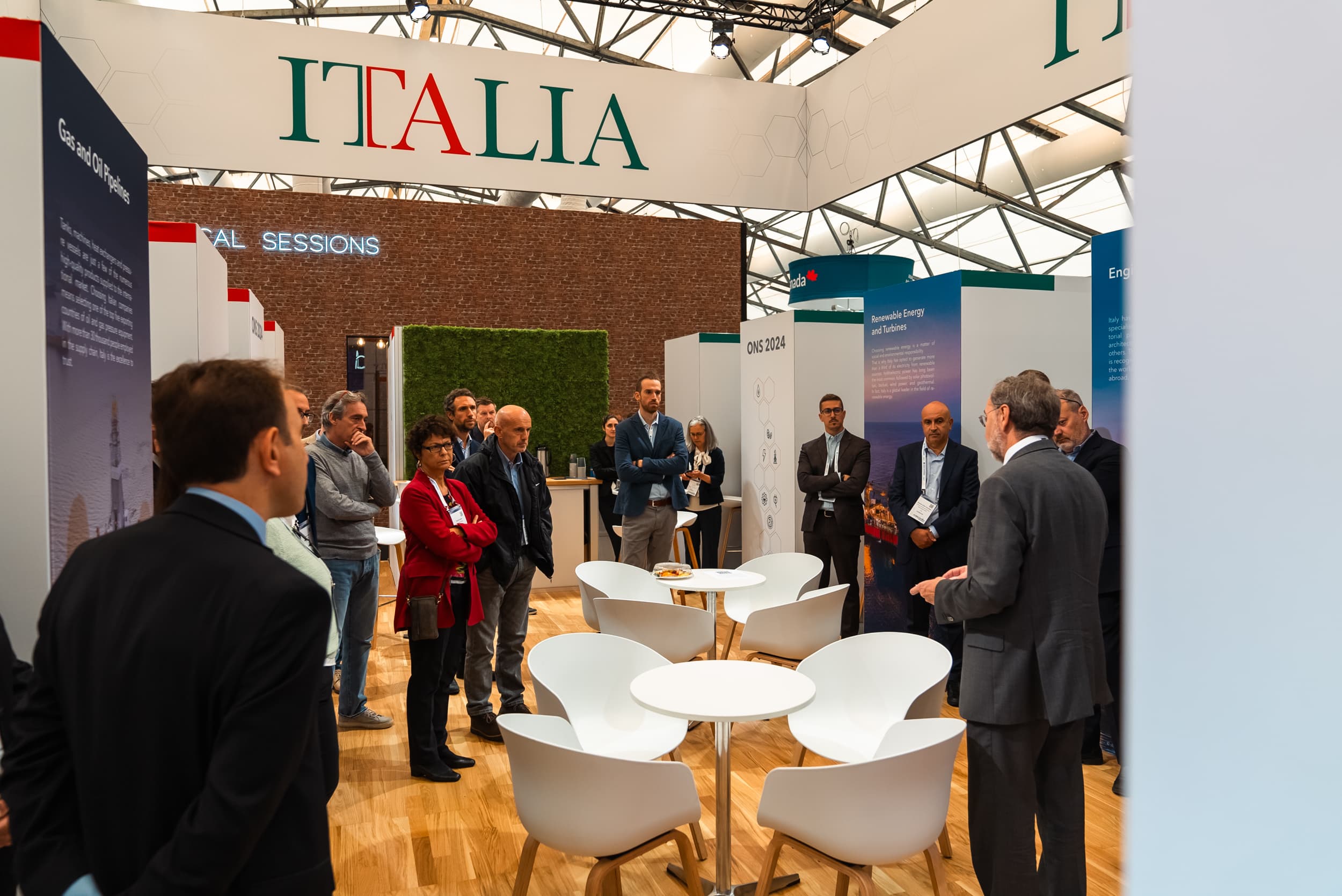 Italian Pavilion at ONS 2024 with shared area and exhibitor booths (3)