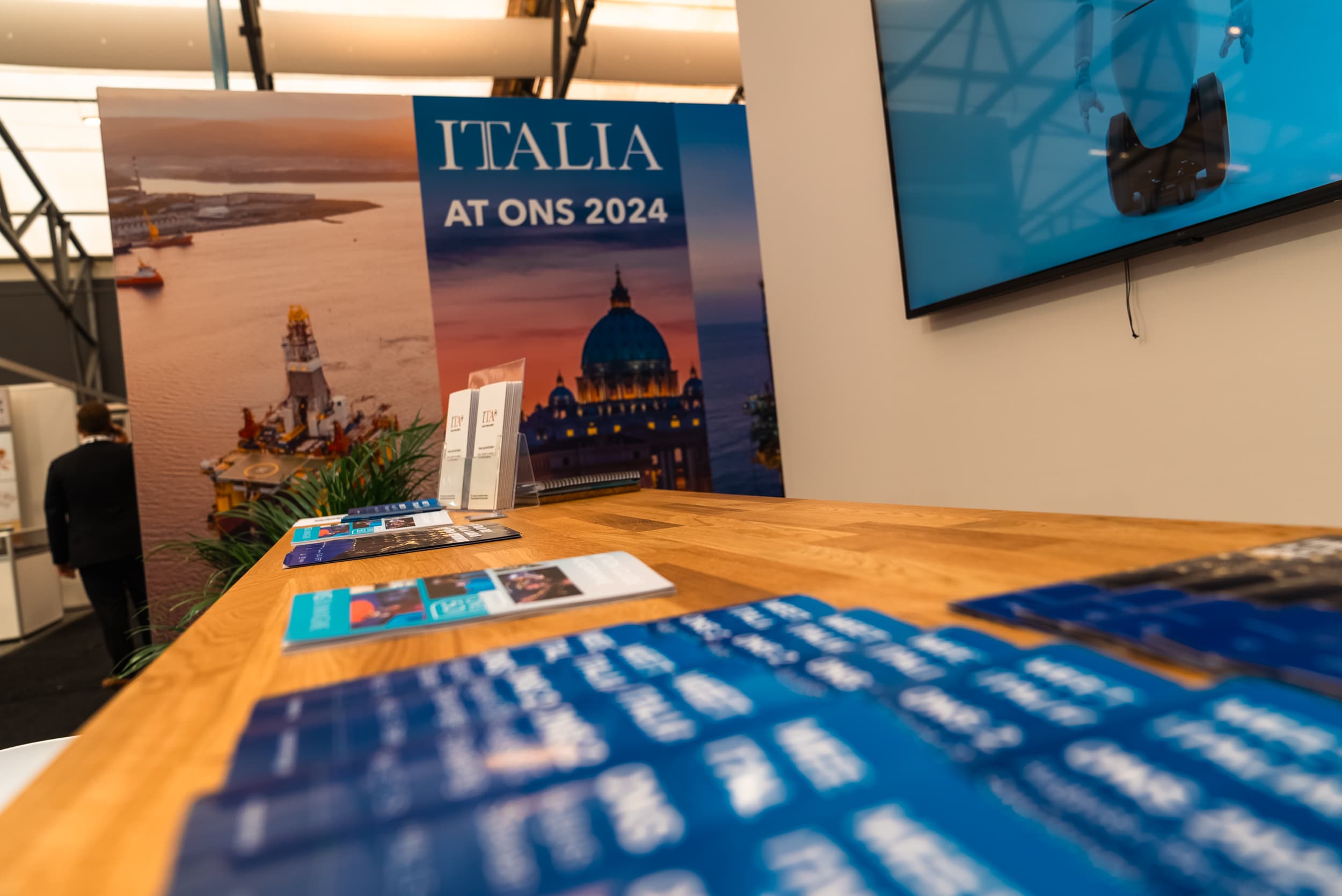 Italian Pavilion at ONS 2024 with shared area and exhibitor booths (6)