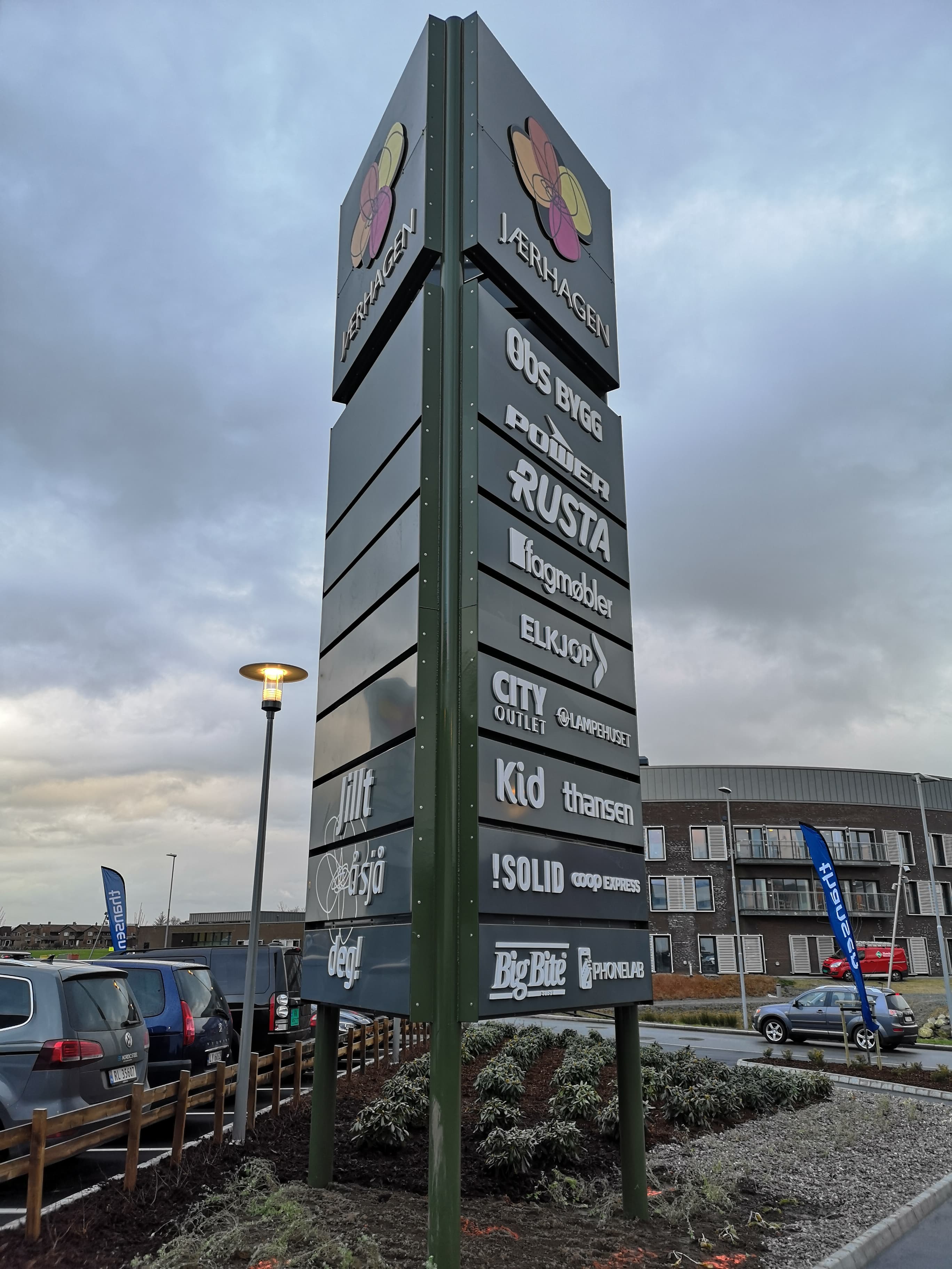 Tall pylon sign with tenant overview at Jærhagen Shopping Centre